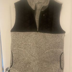 Zyia tweed vest with black collar. Unisex.